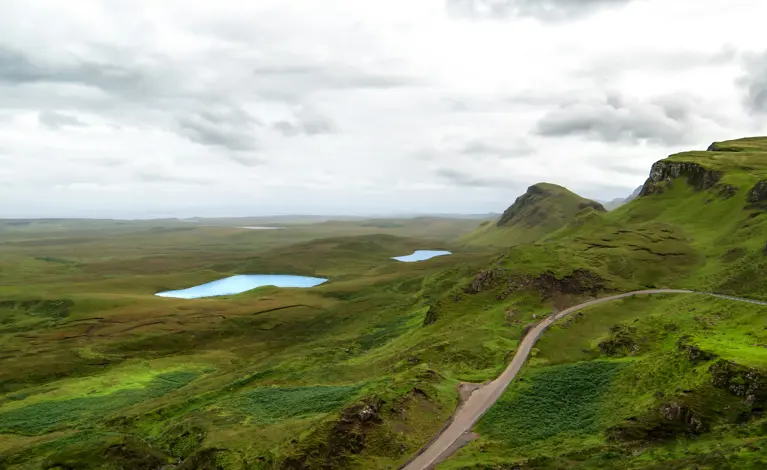 Green grass and lagoons landscape